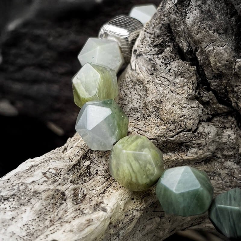 Close-up of 10mm Green Amphibole’s leafy green veining for Heart Chakra emotional balance and love energy