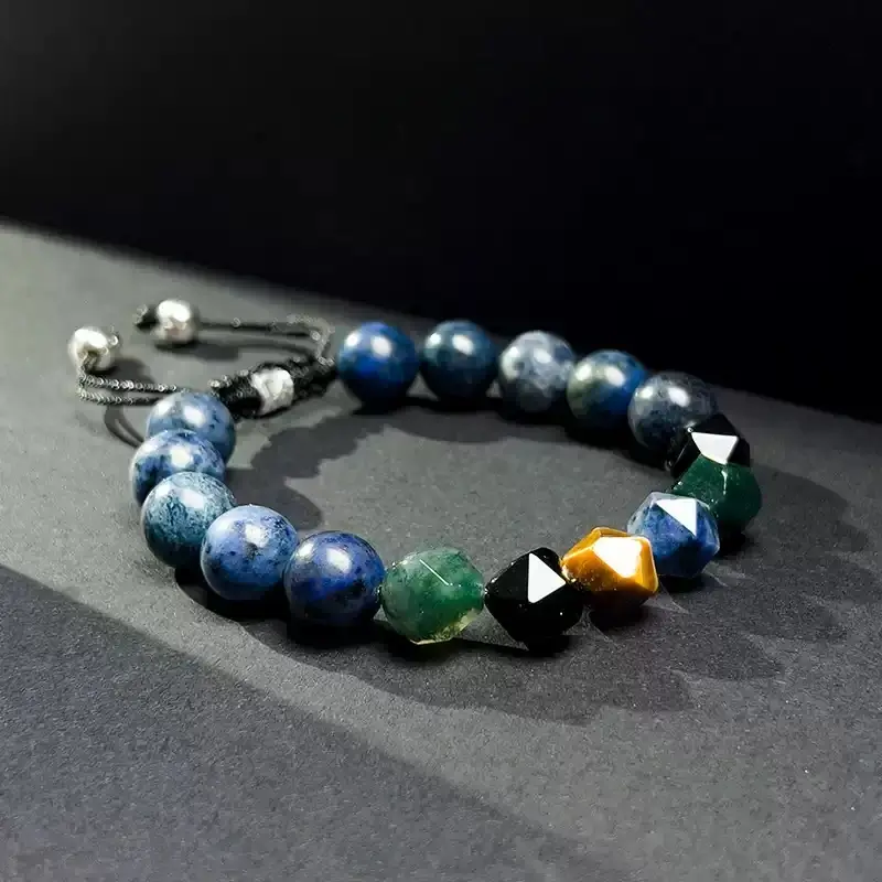 Close-up of Aquatic Agate and Tiger’s Eye beads for Heart Chakra harmony and career confidence in Neptune series