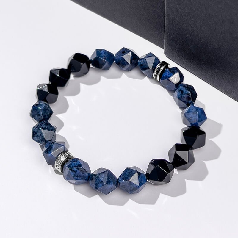 Close-up of Black Agate’s smooth matte surface for Root Chakra stability and negative energy shielding