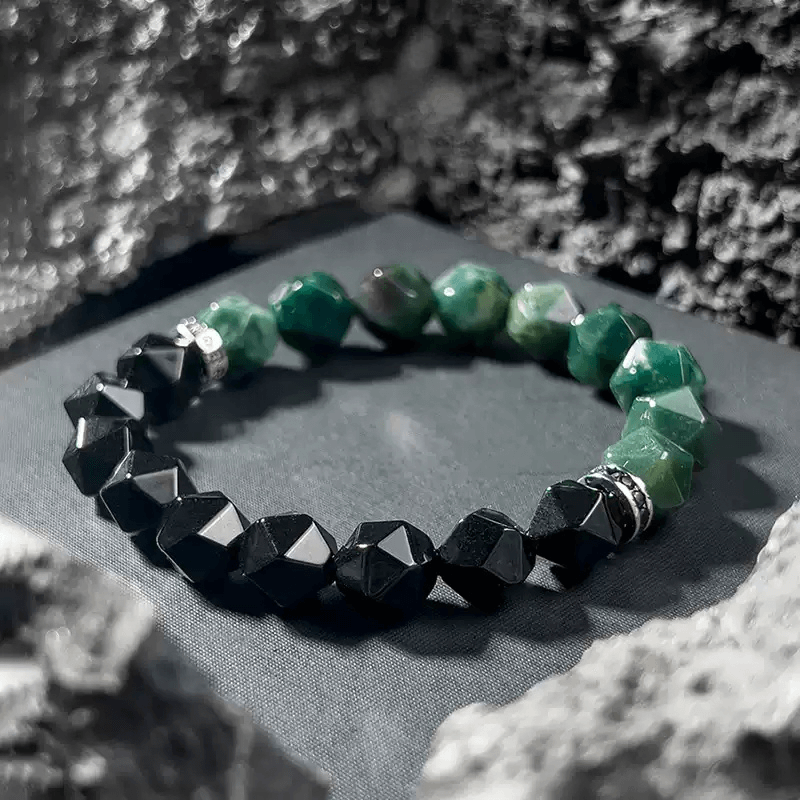 Close-up of Black Agate’s smooth matte surface for Root Chakra security and negative energy protection