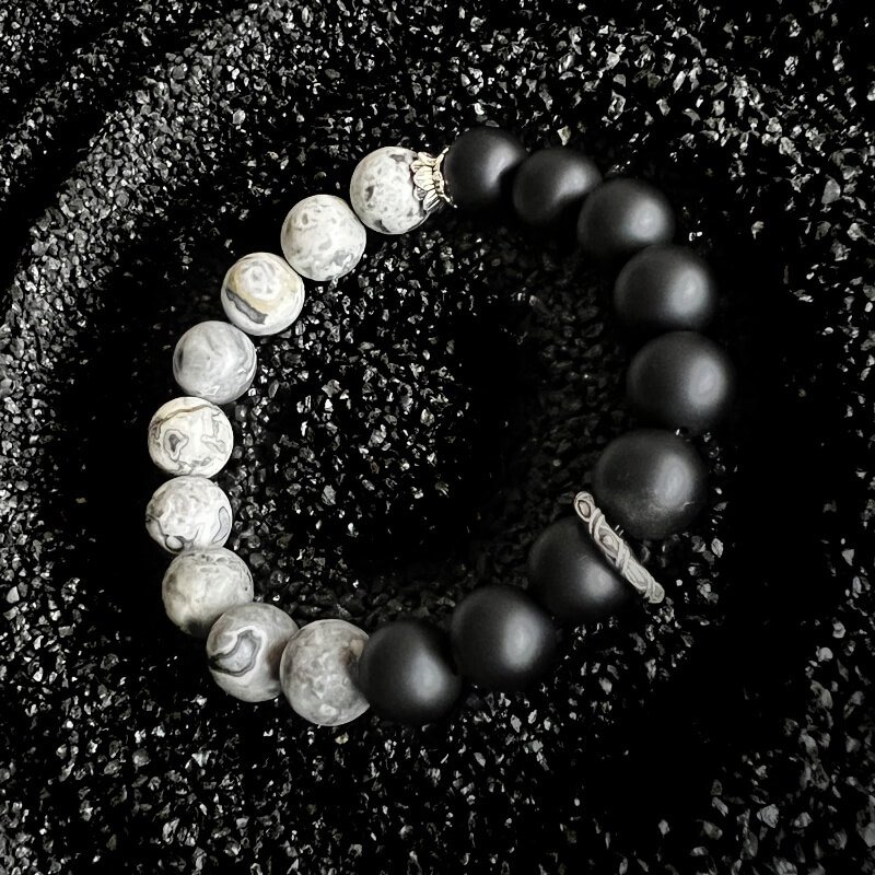 Close-up of Black Onyx’s matte surface for Root Chakra stabilization and negative energy purification