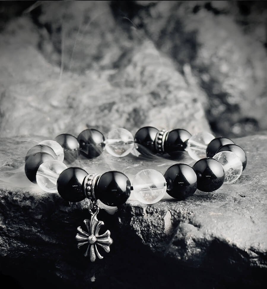 Crown to Root chakra energy flow diagram with White Crystal and Obsidian, harmonizing spirituality and grounding