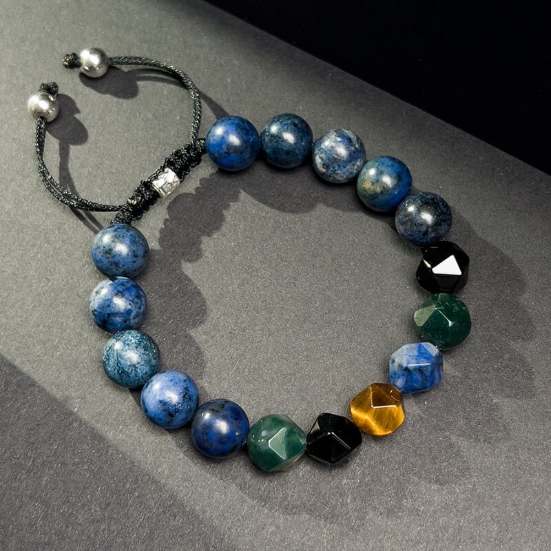 Close-up of Dumortierite and Black Agate beads for Root Chakra stabilization and emotional stability in men’s bracelet