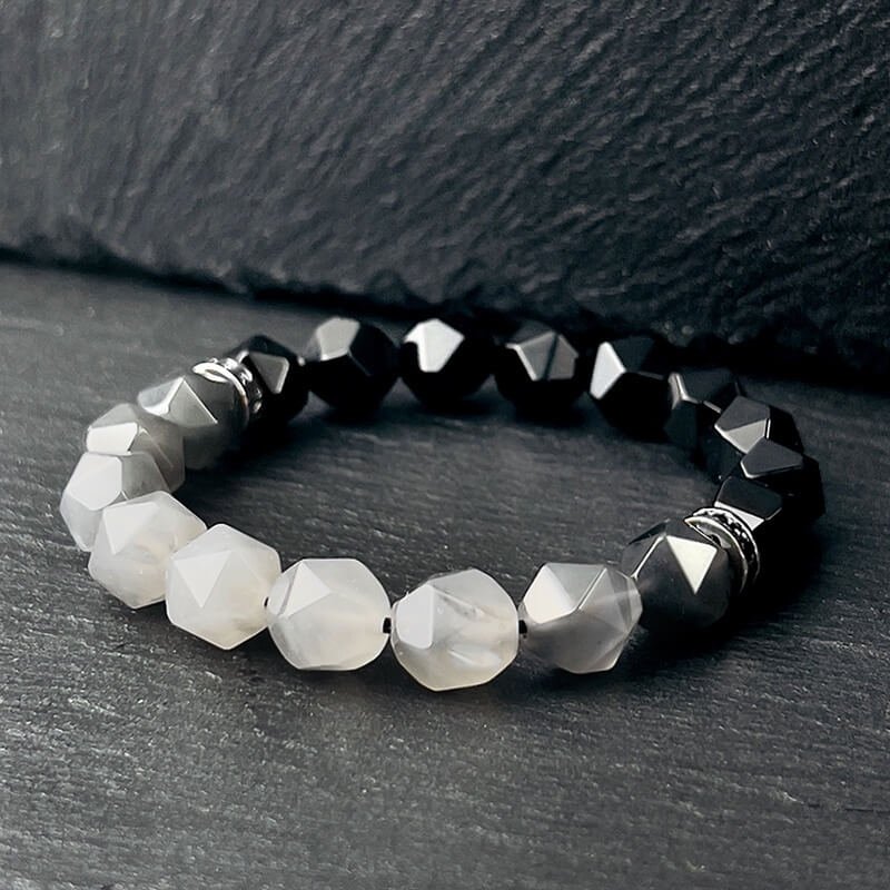 Woman wearing luxury Cloud Crystal bracelet in office for focus and emotional balance, paired with Black Agate for protection