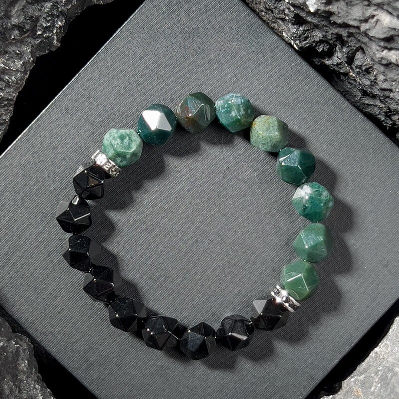 Heart to Root chakra energy flow diagram with Dendritic Agate and Black Agate, balancing emotions and grounding