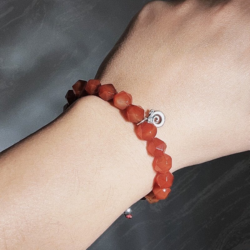 Man wearing 925 Silver Red Agate bracelet for daily vitality and chakra balance