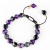 Close-up of 10mm Obsidian (black) and Amethyst (purple) beads – natural textures symbolizing protection and spiritual wisdom.
