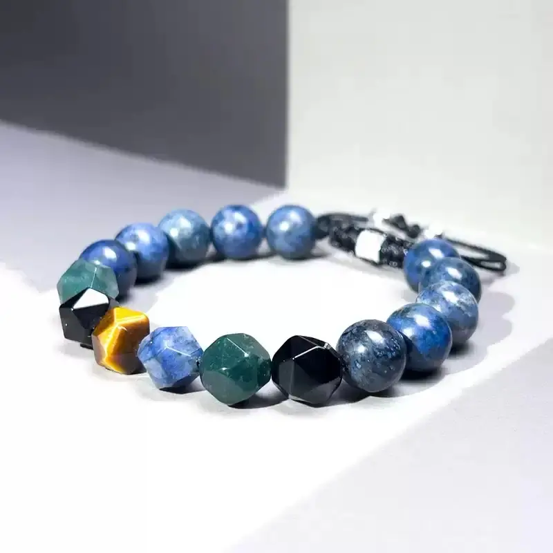 Businessman wearing Neptune series bracelet with Tiger’s Eye for courage and chakra balance in professional settings