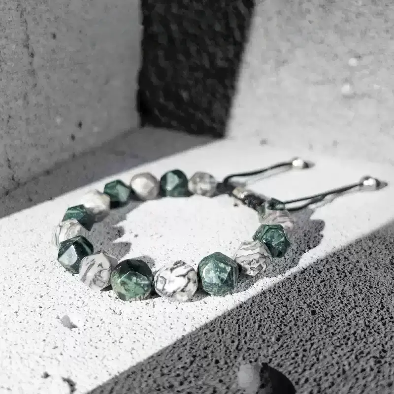 Close-up of Quezai Stone’s leafy green texture for Heart Chakra emotional balance and forest energy