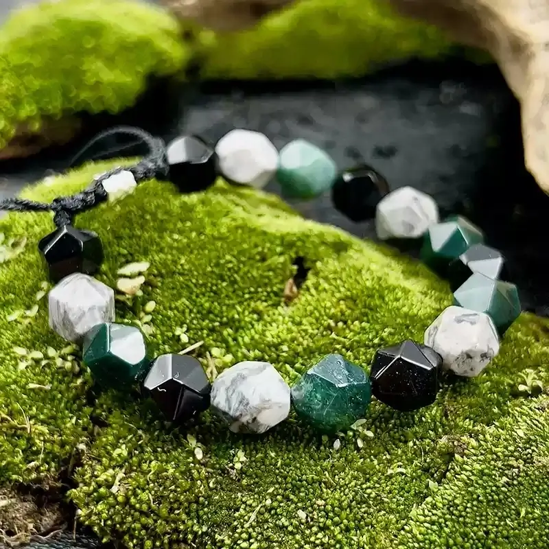 Close-up of Quezai Stone’s forest-green texture for Heart Chakra stress relief and emotional balance