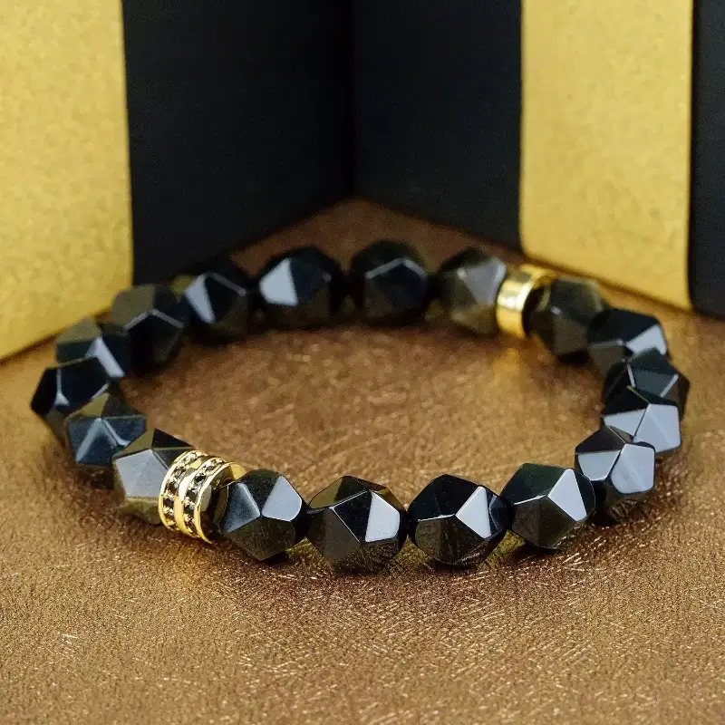 Root Chakra energy diagram with Gold Sheen Obsidian, visualizing wealth grounding and protective shield