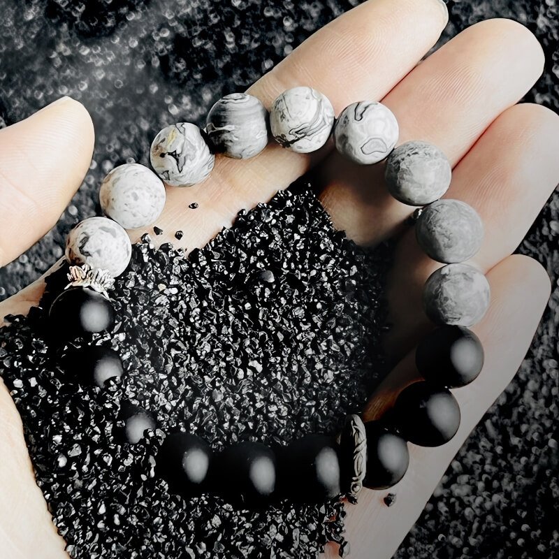 Root and Solar Plexus chakra balance diagram for Black Onyx – Map Stone bracelet, harmonizing protection and exploratory energy