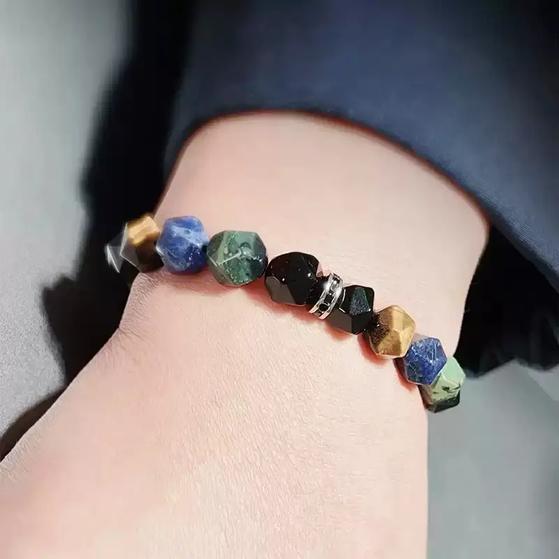 Man and woman wearing lucky gemstone bracelet for daily root chakra stability and throat chakra clarity